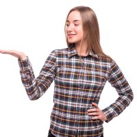 Smiling woman showing open hand palm with copy space for product or text